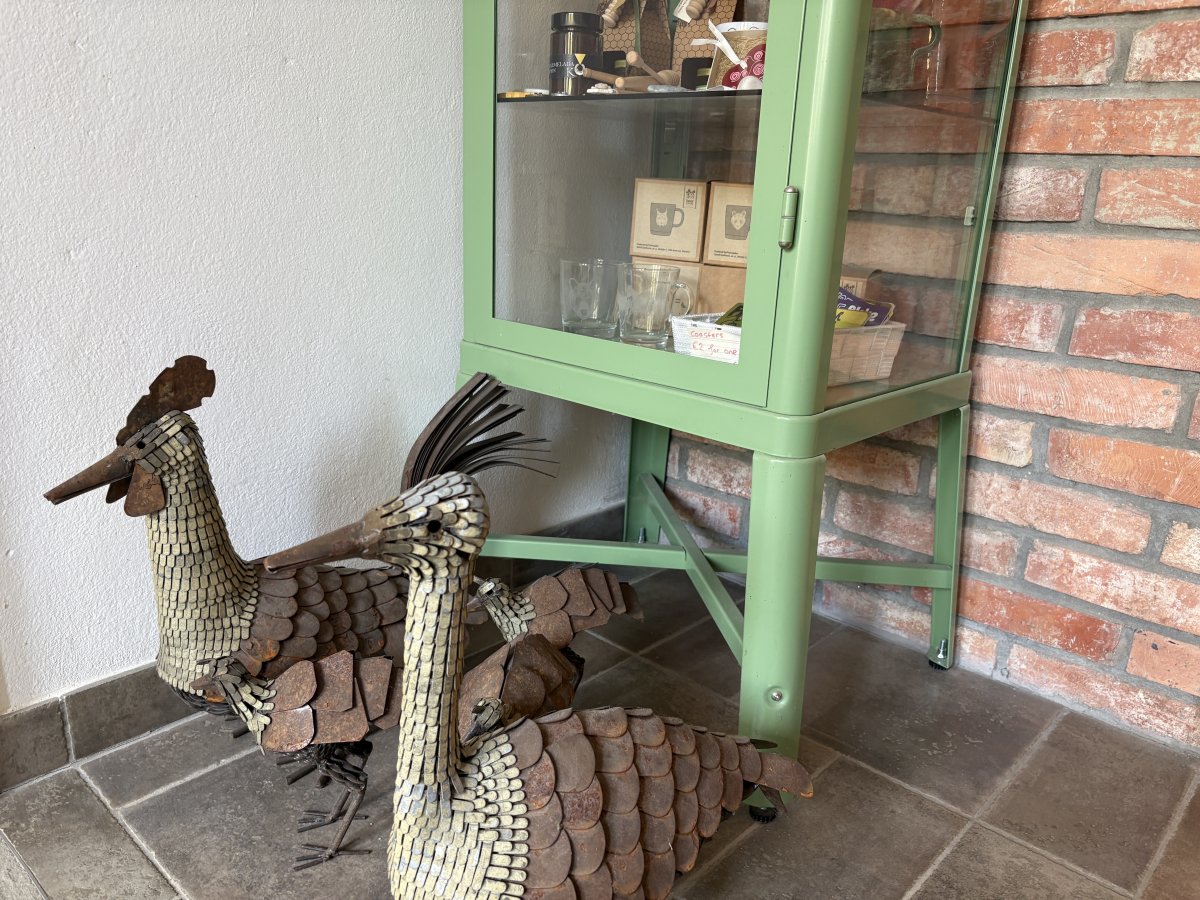 Guard chickens in the entrance foyer..