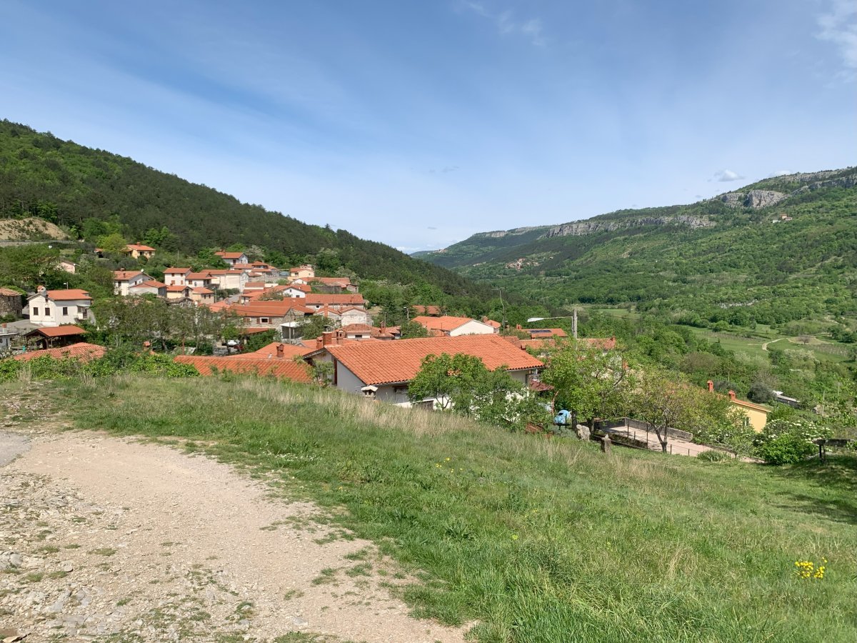 Stunning view from Hrastovlje village across vineyards and olive groves to the last cliff in Slovenia..