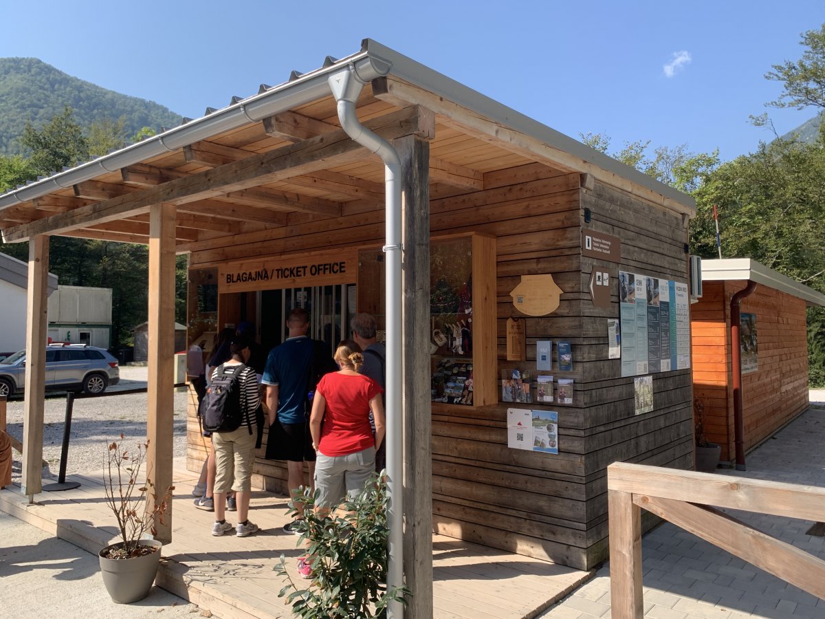 Get your tickets at this shiny new ticket office next to the cable car station..