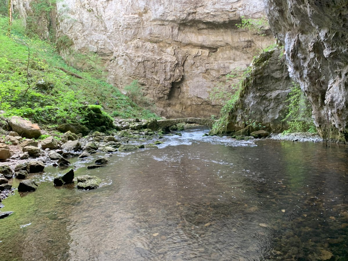 A glimpse back at the stone bridge as you go further into the stone valley..
