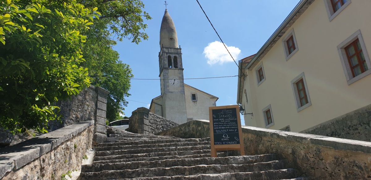 the church is beautiful and sits at the top of this stone staircase..