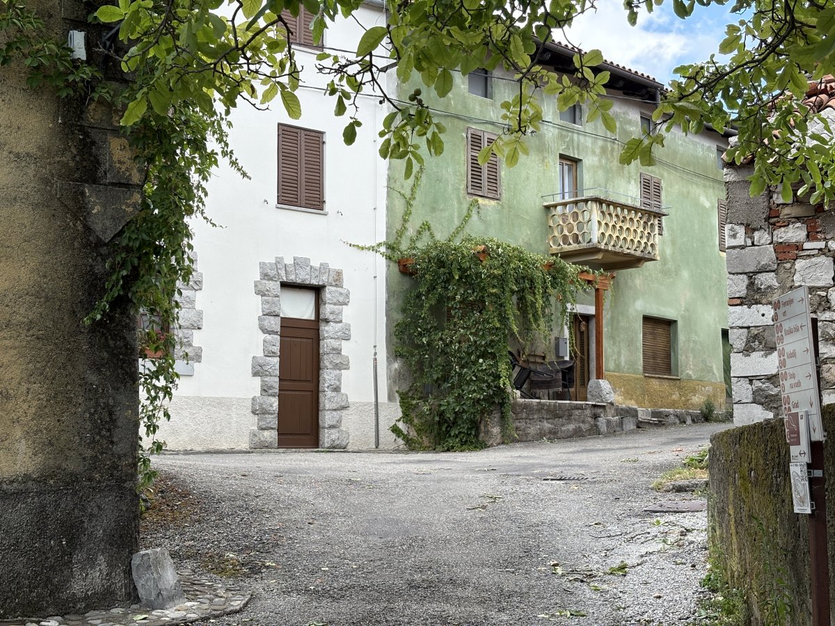 Strong Mediterranean, Medieval look and a Yugoslavian looking concrete balcony, perfect for storing large bottles of wine..