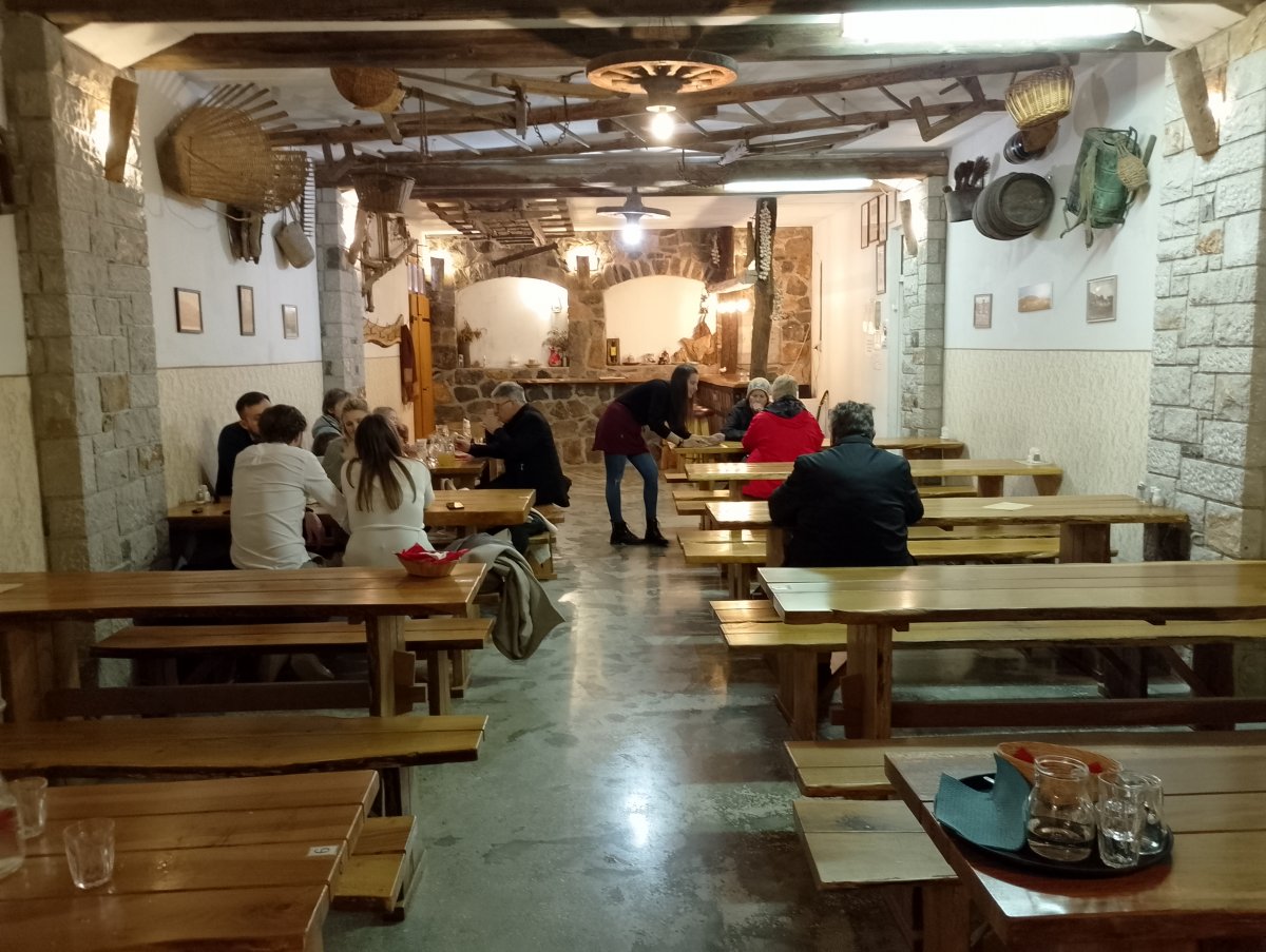 typical Osmica winery scene.. People enjoying the local offer..