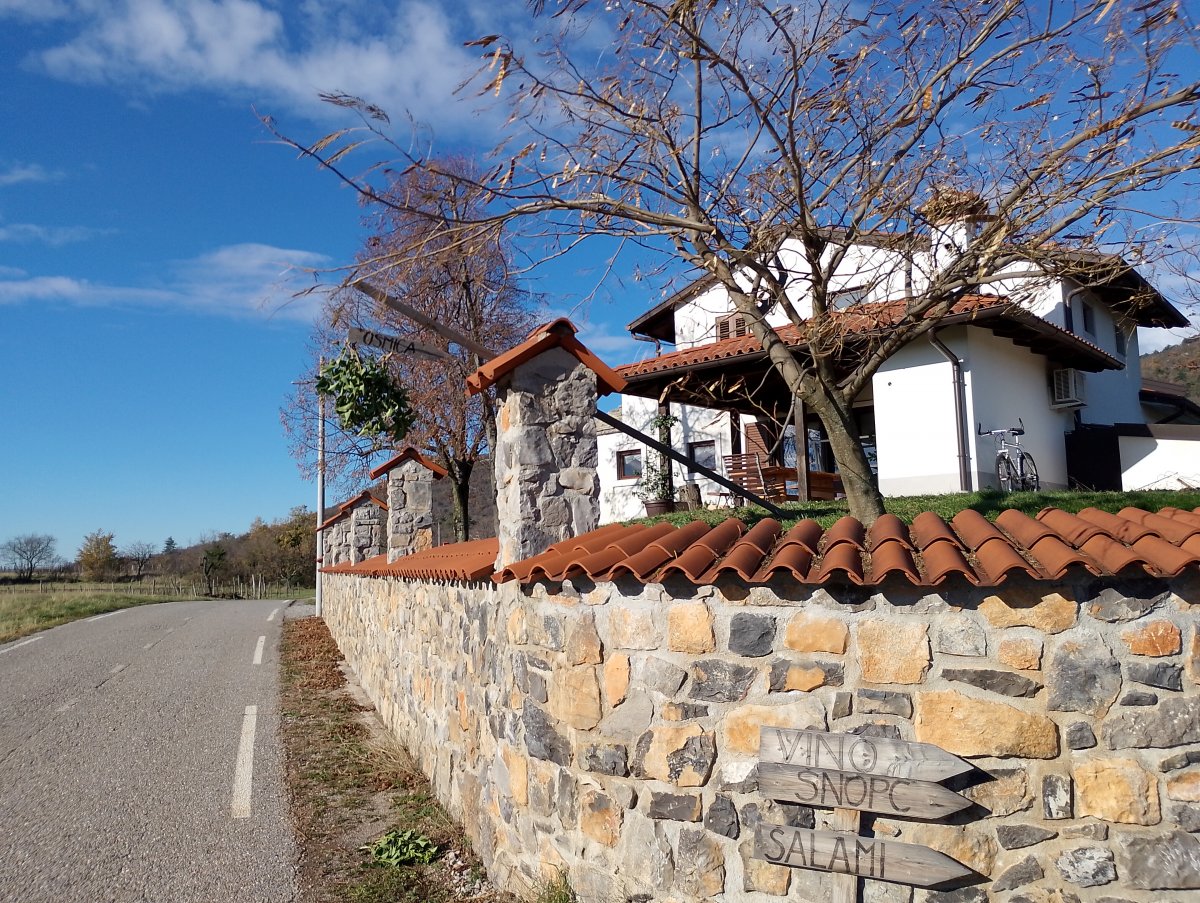 Look carefully to spot the branch and Osmica sign outside this farm..