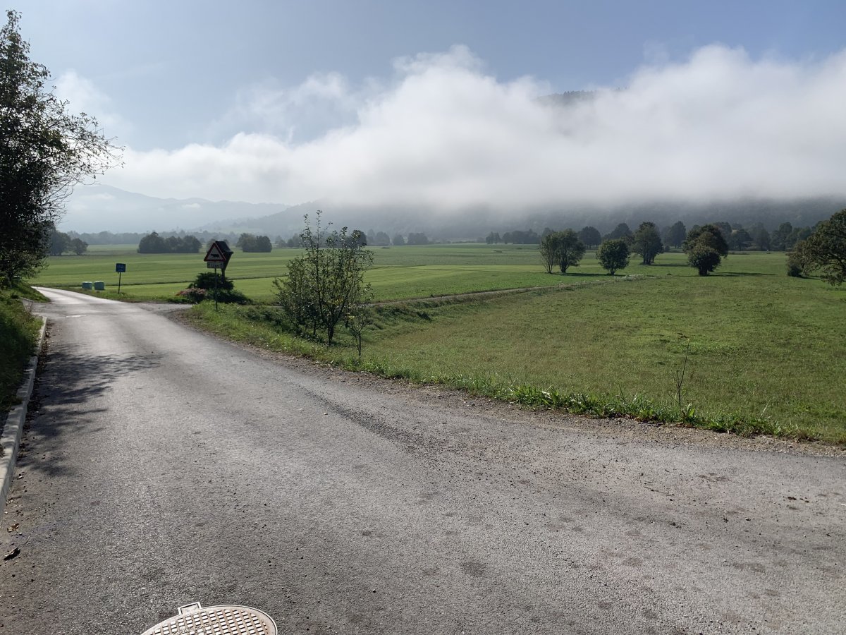 after the village of LAZE there is this long bike road that hugs the side of the lake..