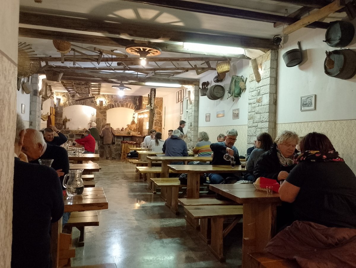 Red Karst farmhouse full of guests for the seasonal treat of Osmica..