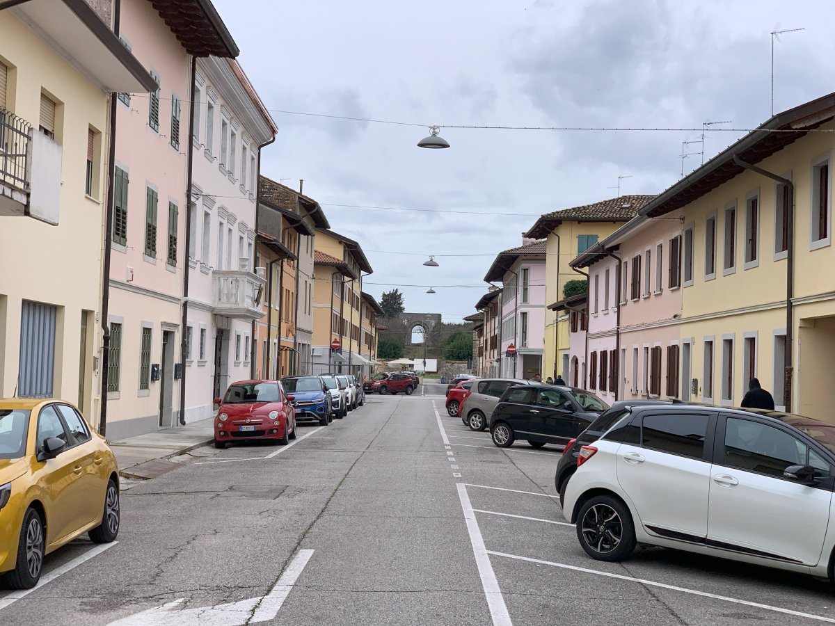 The streets look so normal inside the city, but can you see the huge circle wall at the end of the road..