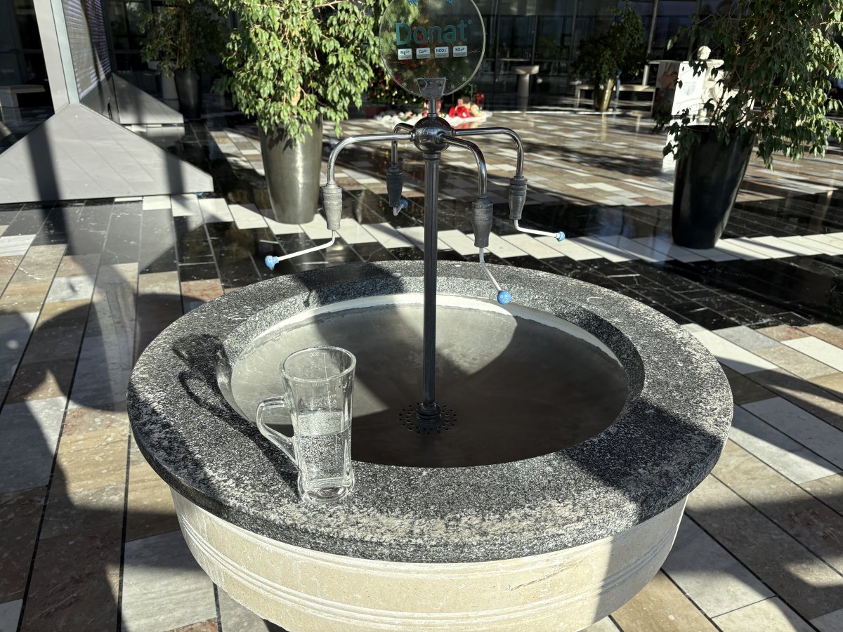 Fill your glass from one of the pumps, the general choice is cold or luke warm,,