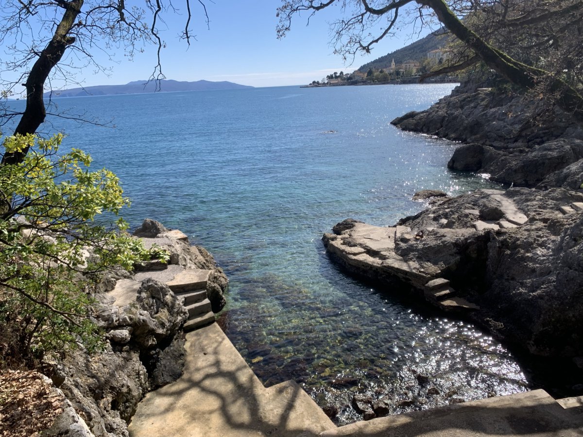 Numerous little stone beaches along the low cliffs of the Lungomare coastal walk in Opatija..