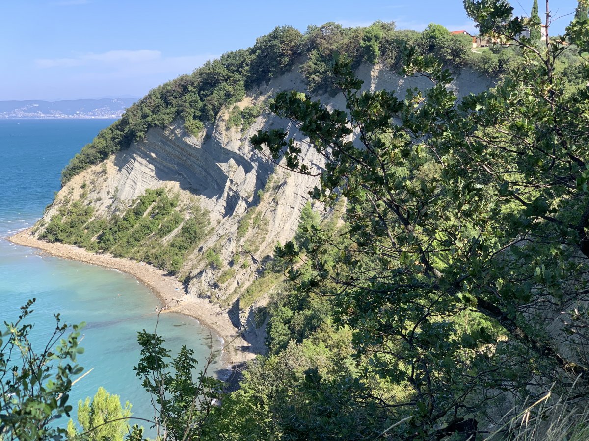 Moon Bay comes into view from the cliff top path..