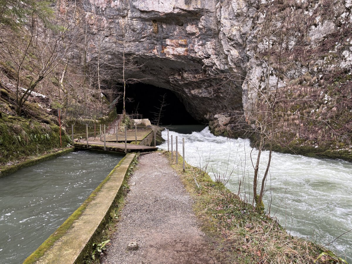 You can walk inside the massive mouth of Planina Cave and walk alongside the River of 7 Names..