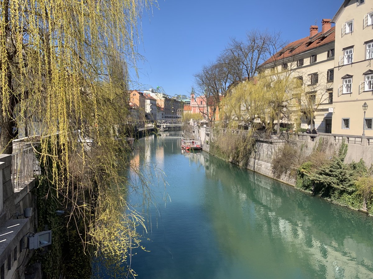Ljubljana.. Cafes and restaurants along the river..